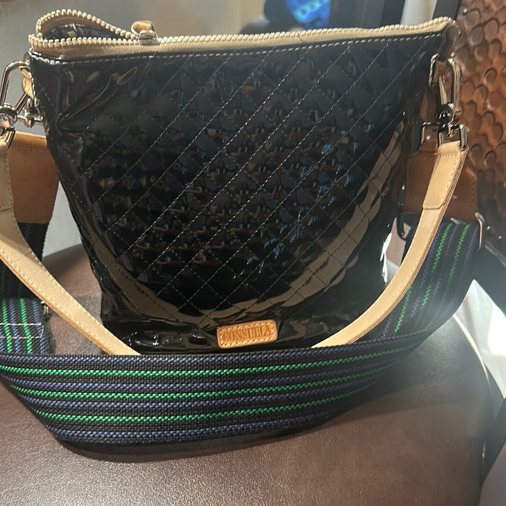 Consuela bag with both straps. Can be worn over shoulder or crossbody.
